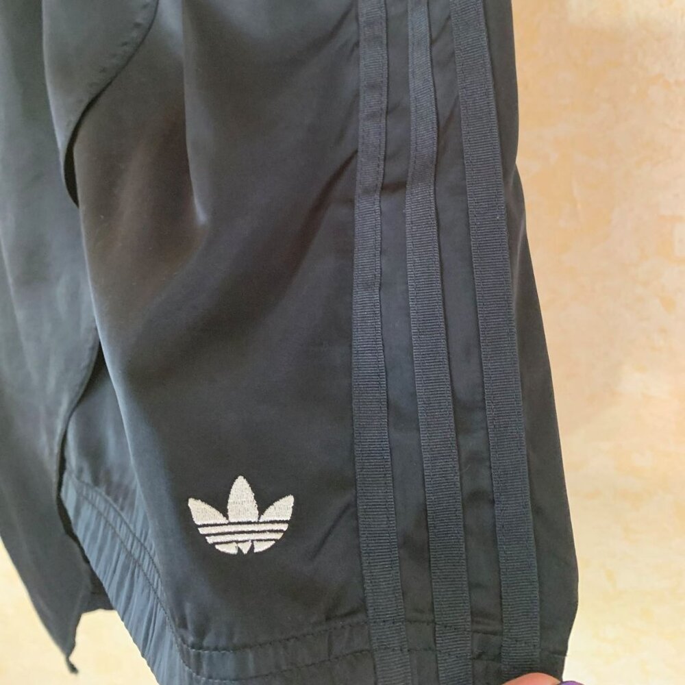 2/$40 adidas Asymetrical skirt with pockets and Silver embroidered Tri-foil logo